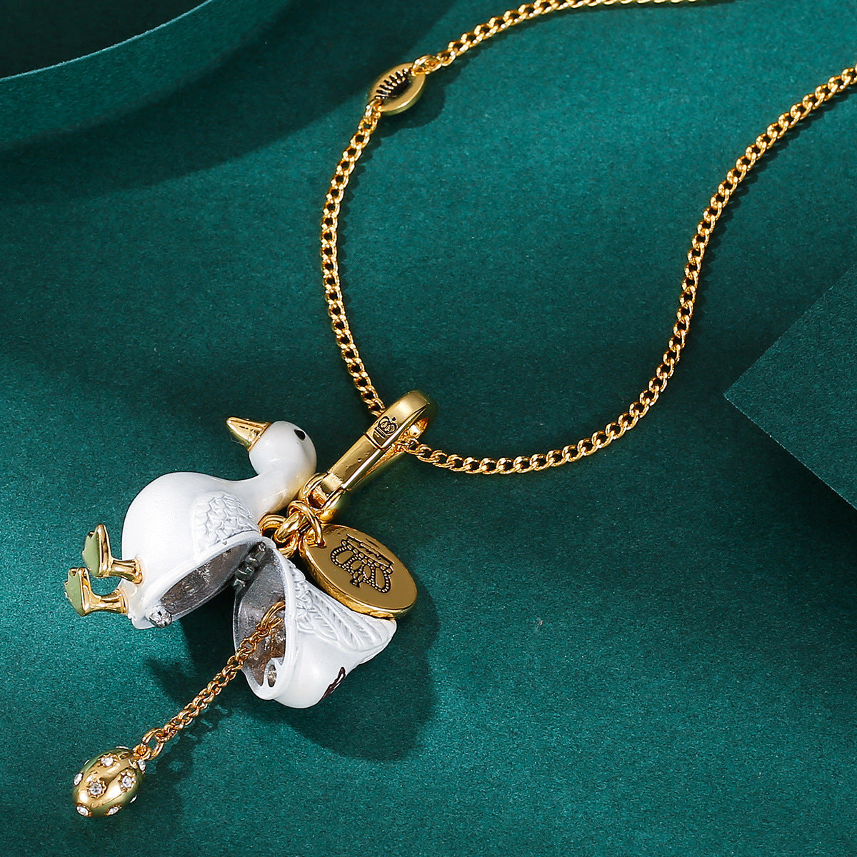 Accessory temperament enamel glaze color glaze print gray swan can be opened gold egg pendant pendant pendant